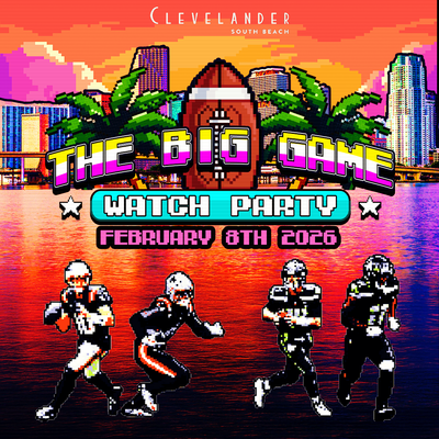 a group of people running in front of water