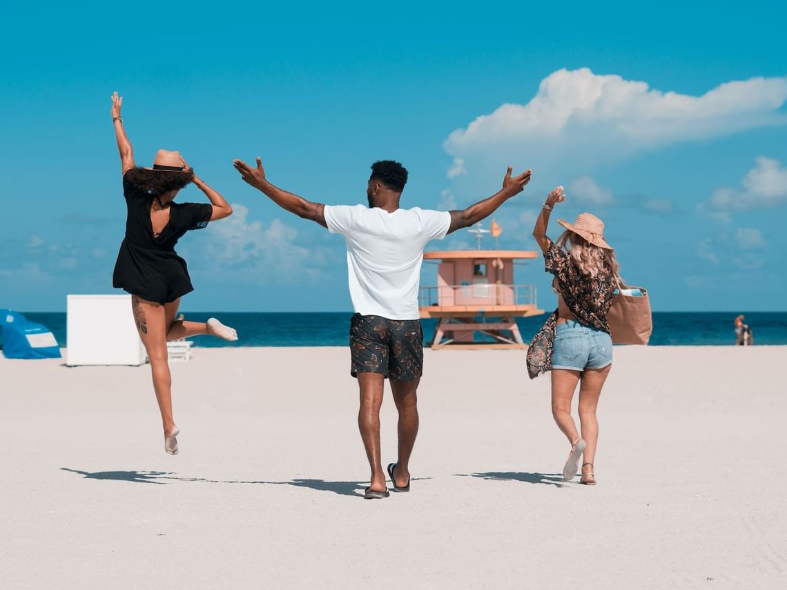 a group of people on a beach